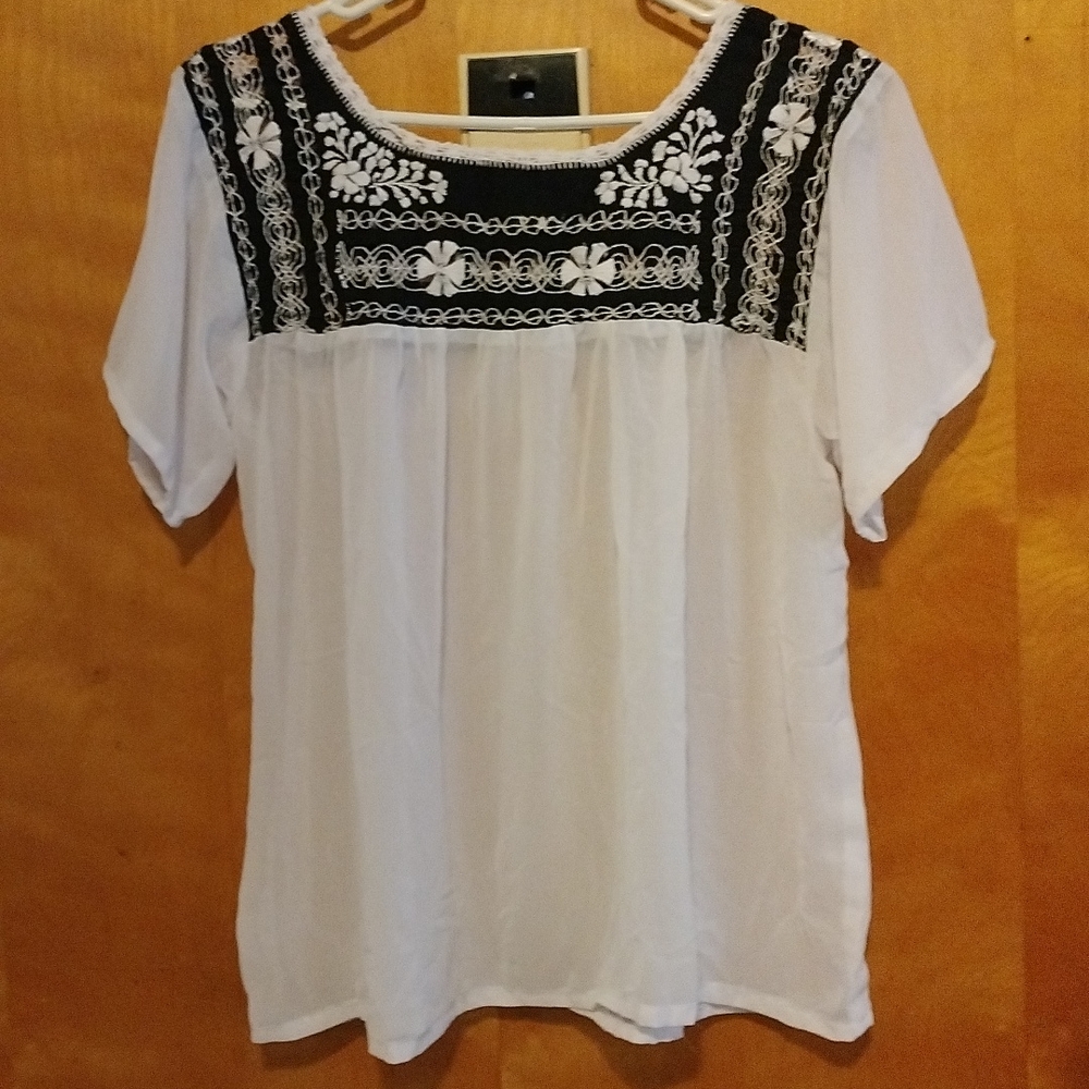 Frayed blouse from Oaxaca.